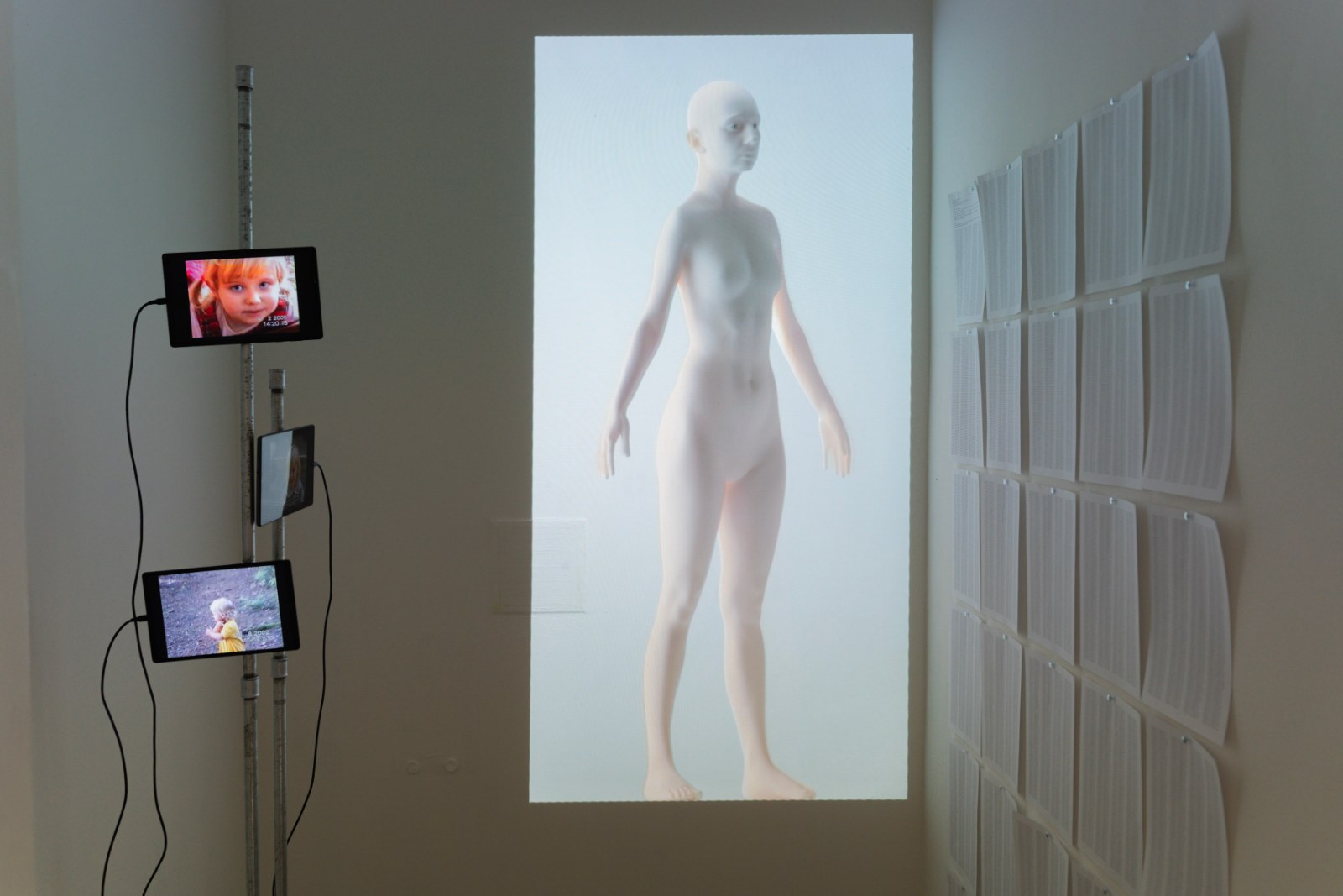 Life-size figure projected behind sheer curtains