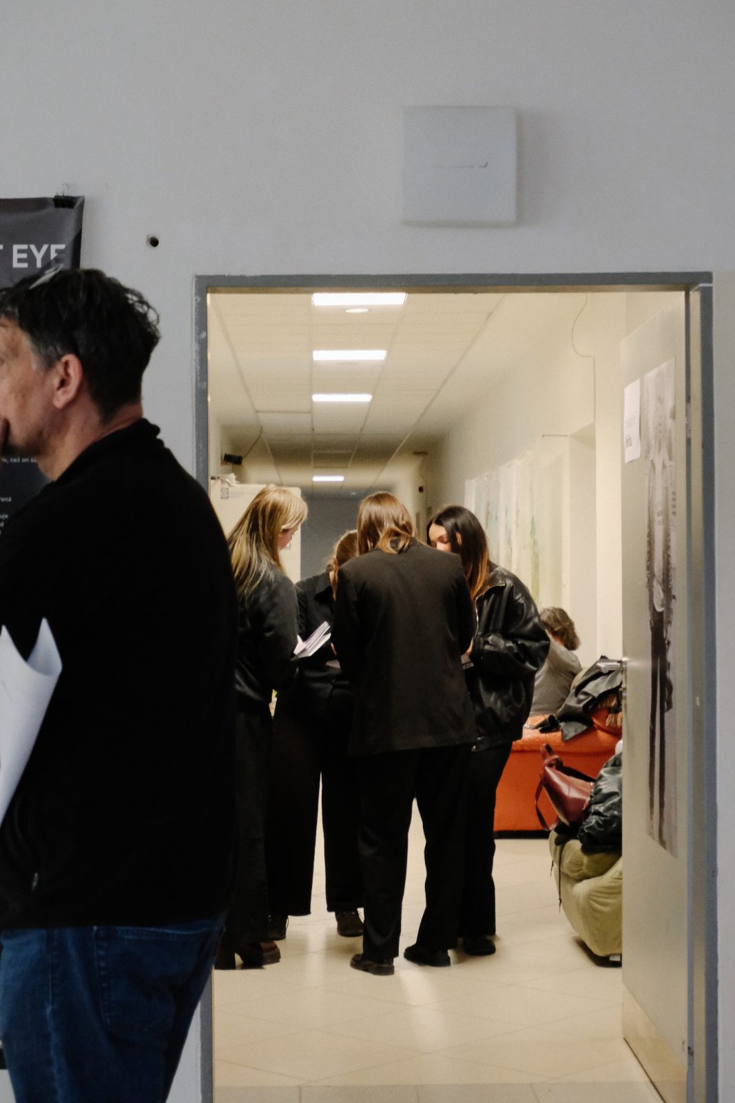 Visitors in a school corridor